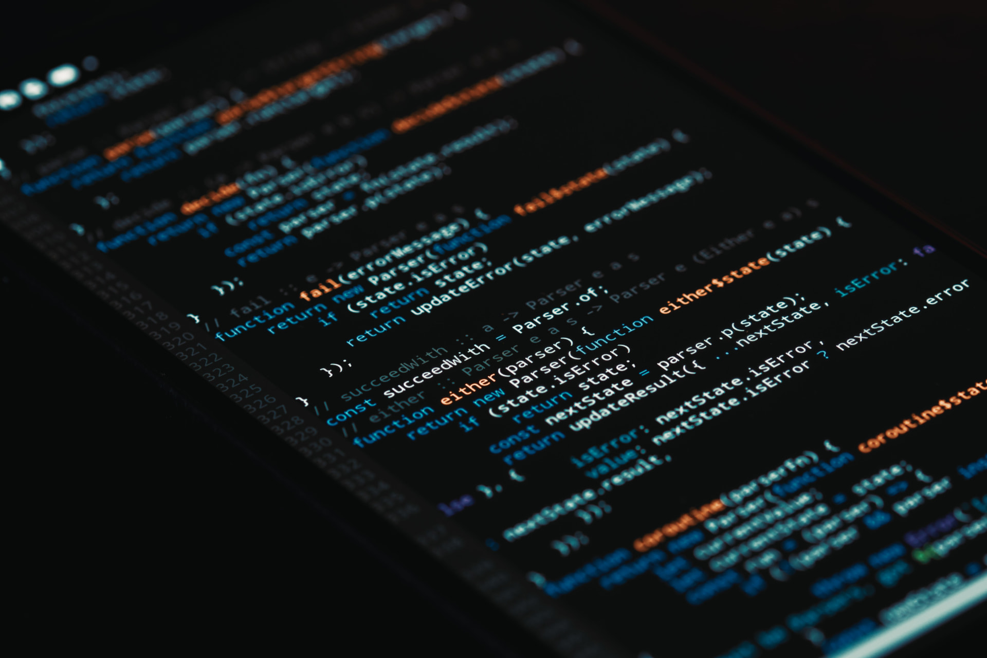Colorful programming code on a dark screen